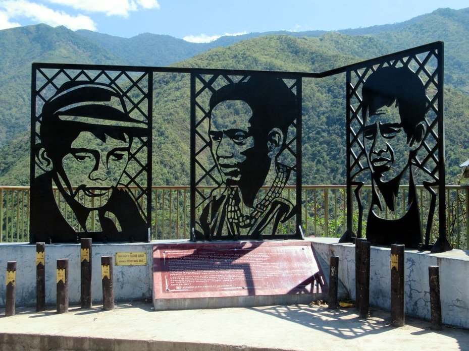 A monument in Kalinga District, the Philippines, erected in tribute to three leaders of the Chico Dam Resistance: Macli-ing Dulag (centre), Pedro Dungoc (left) and Lumbaya Aliga Gayudan (right)