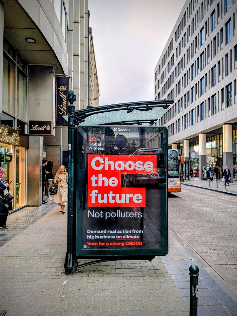 poster promoting csddd bill in brussells, eu against proposed weakened omnibus proposal