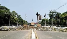 photo of black flags and barricade during myanmar coup