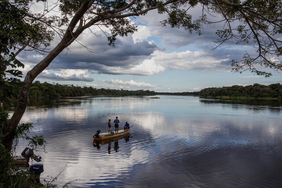 Members of the Quilombola community of Pedras Negras fish in the Guapore river in Brazil. Traditional practices of Indigenous, Afro-descendant and campesino communities often go hand in hand with land and environmental protection.