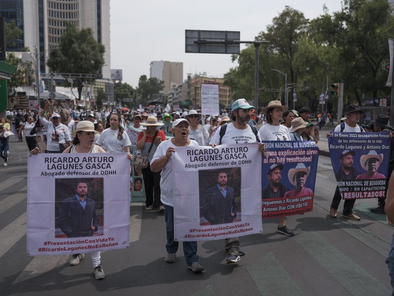Family members of Ricardo Arturo Lagunes Gasca, a renowned human rights lawyer, during a protest for disappeared people on Mother's Day in the centre of Mexico City