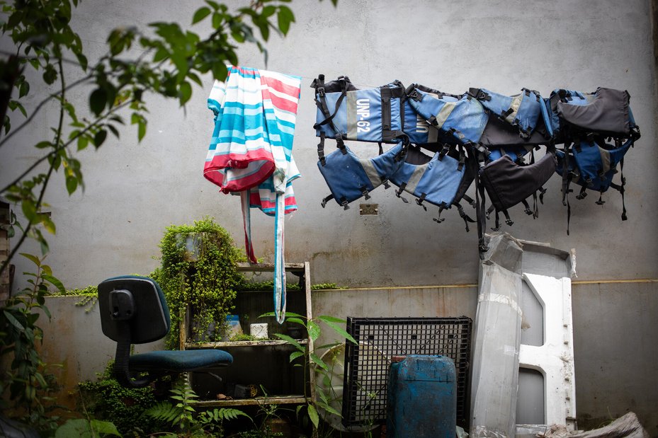 Bullet proof vests hang at Jani Silva's home. After six months of requesting, persuading and waiting, the Colombian government finally granted me basic protection measures in 2014: a bulletproof vest and a mobile phone.
