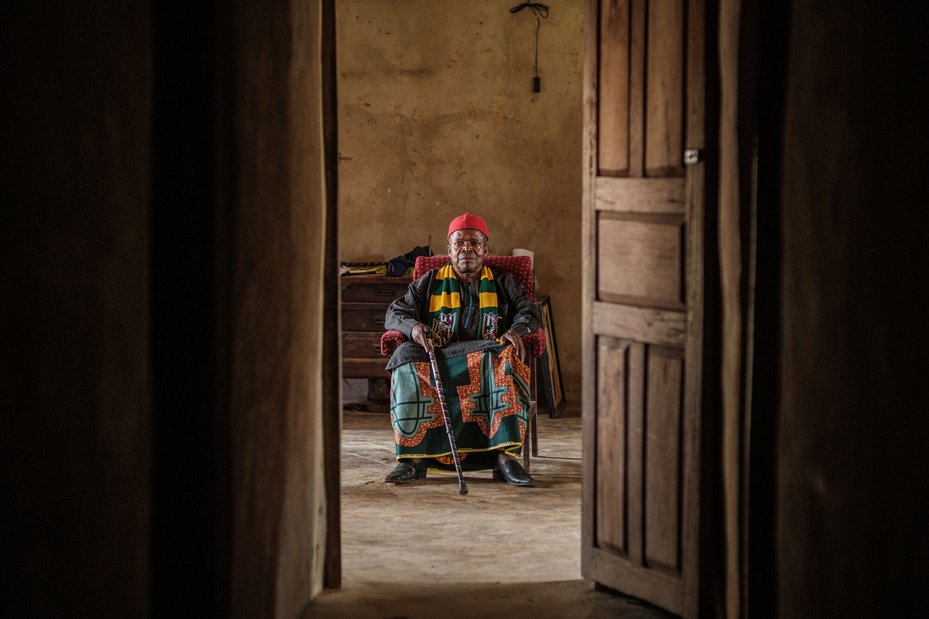 Chief Abel Egbe sits in his house in New Ekuri, home to the Indigenous Nkukorli Peoples.