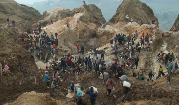 workers at coltan mine in rubaya area, drc