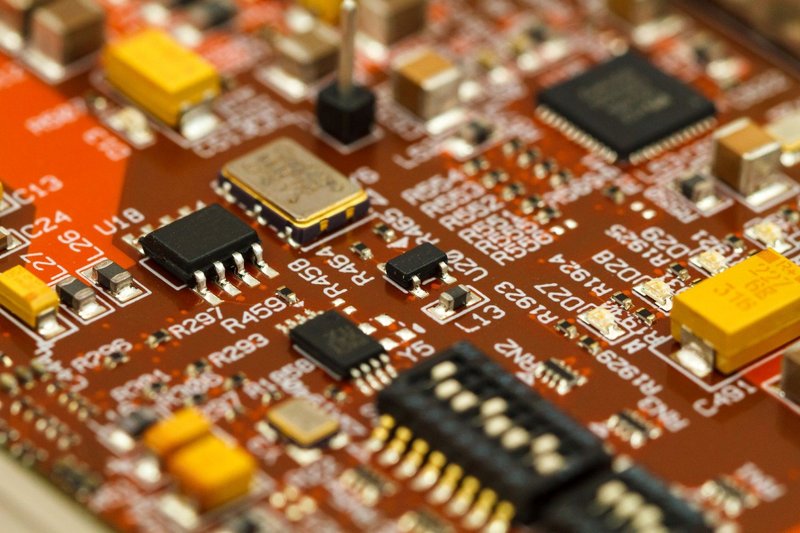 PCB with ICs, chip capacitors, and chip resistors